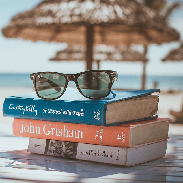 strand parasol boeken vakantie