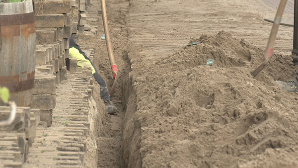 glasvezel werkzaamheden straat graven